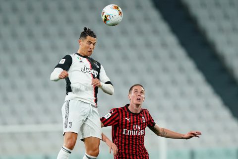 12 June 2020, Italy, Turin: Juventus' Cristiano Ronaldo (L) and Milan's Andrea Conti battle for the ball during the Coppa Italia semi final soccer match between Juventus and AC Milan at Allianz Stadium. Photo: -/Lapresse via ZUMA Press/dpa