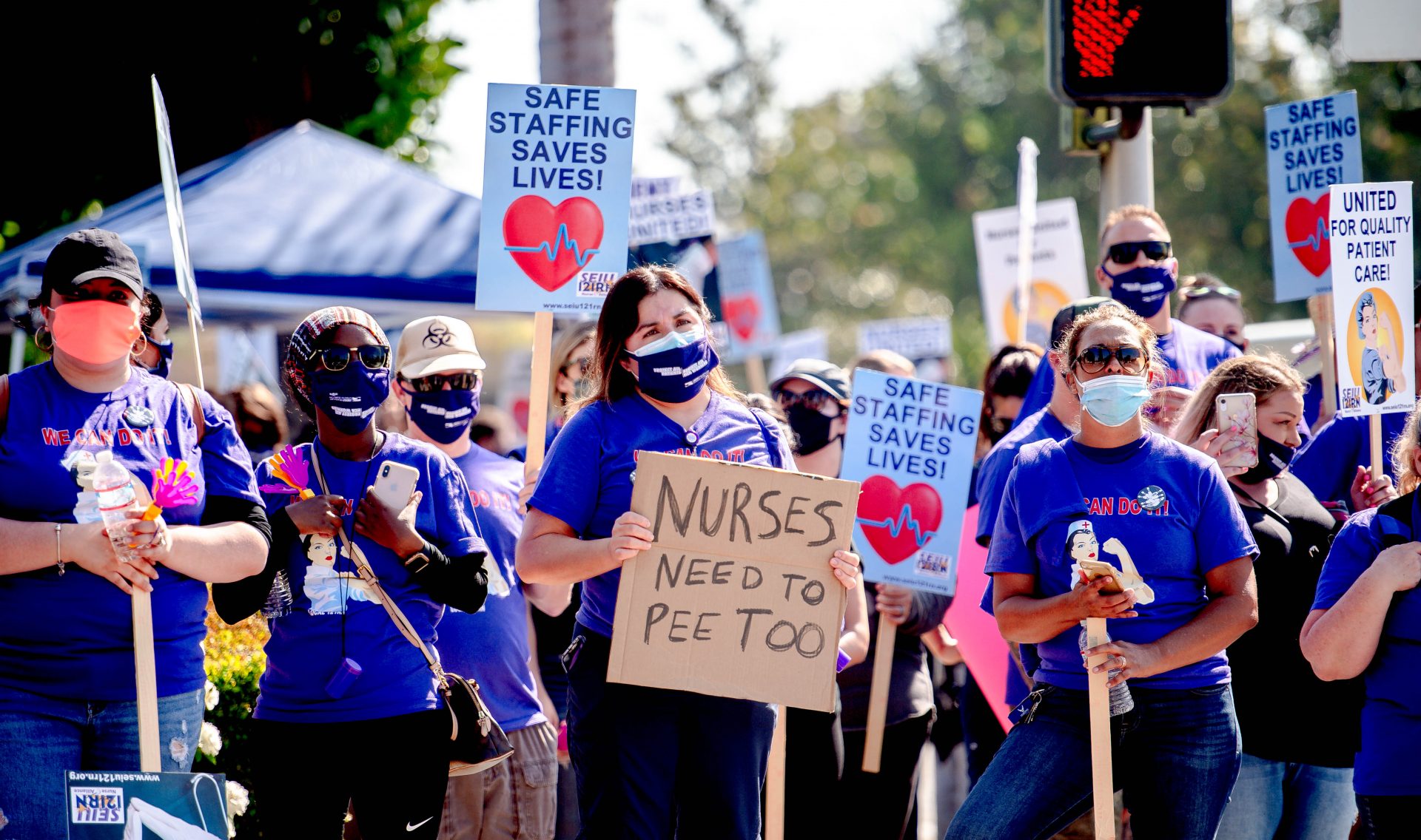 26 June 2020, US, Riverside: Riverside Community Hospital registered nurses, all members of the labor Union SEIU Local 121RN, picket outside the hospital's campus in Riverside, as they launch a 10-day strike over the patient and nurse safety issues. Photo: Watchara Phomicinda/Orange County Register via ZUMA/dpa