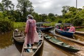 08 July 2020, Brazil, Tefe: Medical personnel from the Special Secretariat for Indigenous Health board boats after visiting an indigenous community to provide medical care for the indigenous people amid the spread of the coronavirus pandemic. Photo: Diego Baravelli/dpa