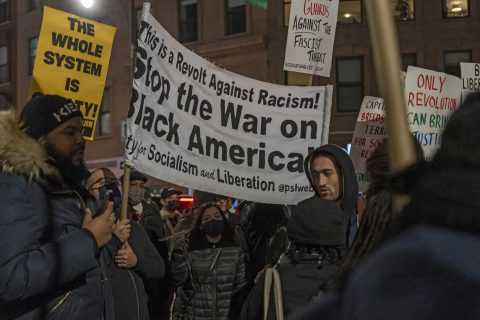 19 November 2021, US, New York: People march with placards during a protest in Brooklyn against the acquittal of Kyle Rittenhouse, who shot and killed two men and wounded another during the Kenosha unrest on 25 August 2020. Photo: Ron Adar/SOPA Images via ZUMA Press Wire/dpa