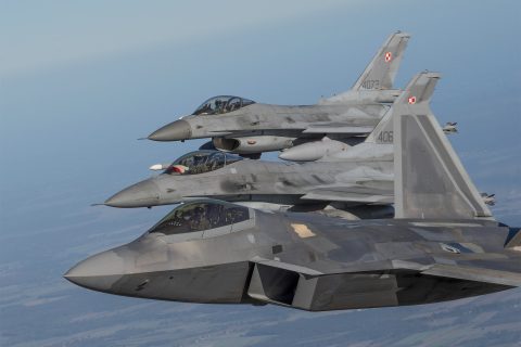 12 October 2022, Poland, Lask: A US Air Force F-22 Raptor fighter aircraft (front) assigned to the 90th Expeditionary Fighter Squadron conduct a NATO Air Shielding Mission with two Polish Air Force F-16 fighters. Photo: Ssgt Danielle Sukhlall/U.S Air via Planet Pix via ZUMA Press Wire/dpa