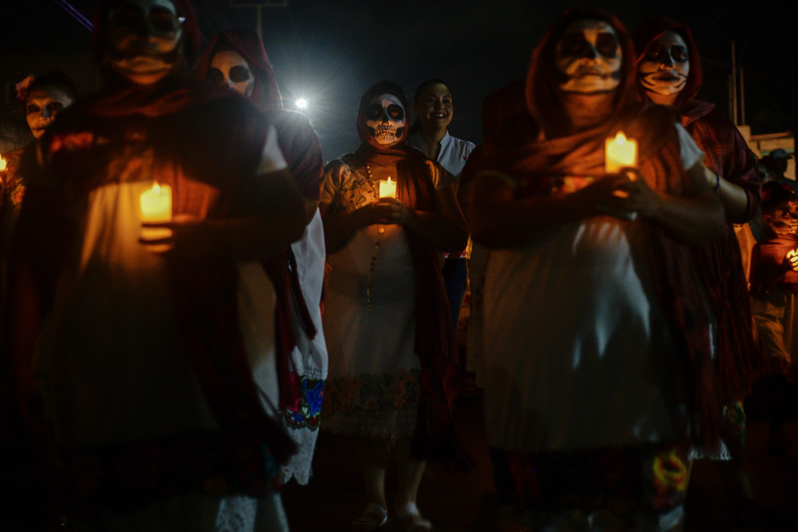 01 November 2022, Mexico, Progreso: Costumed people take part in the "Walk of the Souls" during Mexico's Day of the Dead. Photo: Mariana Gutierrez/eyepix via ZUMA Press Wire/dpa