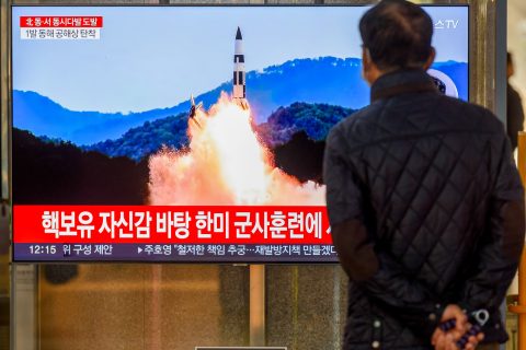 02 November 2022, South Korea, Seoul: A man watches a television screen showing a news broadcast with file footage of a North Korean missile launch, at a railway station in Seoul. North Korea fired about 10 missiles, including three short-range ballistic missiles (SRBMs) launched into the East Sea. Photo: Kim Jae-Hwan/SOPA Images via ZUMA Press Wire/dpa