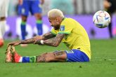 09 December 2022, Qatar, Al-Rayyan: Brazil's Neymar sits on the pitch during the extra time of the FIFA World Cup Qatar 2022 Quarter-Final soccer match between Croatia and Brazil at the Education City Stadium in Al Rayyan. Photo: Robert Michael/dpa